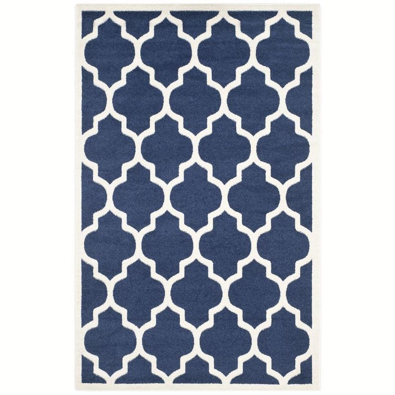 Reversible Geometric Navy and Beige 5' x 8' Synthetic Area Rug