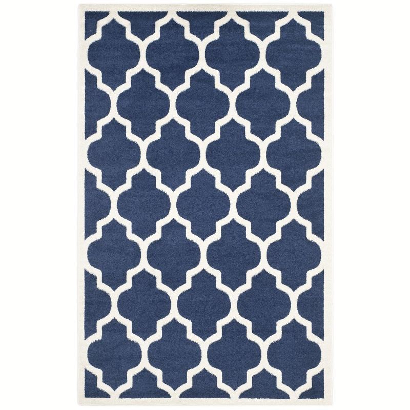 Reversible Geometric Navy and Beige 5' x 8' Synthetic Area Rug