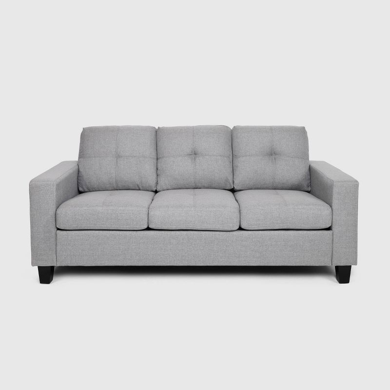 Contemporary Gray Tufted Sofa with Sloped Arm and Wood Legs