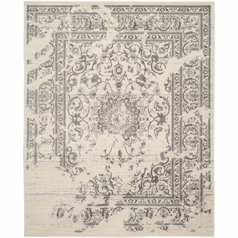 Ivory and Silver Synthetic 8' x 10' Easy-Care Rectangular Rug