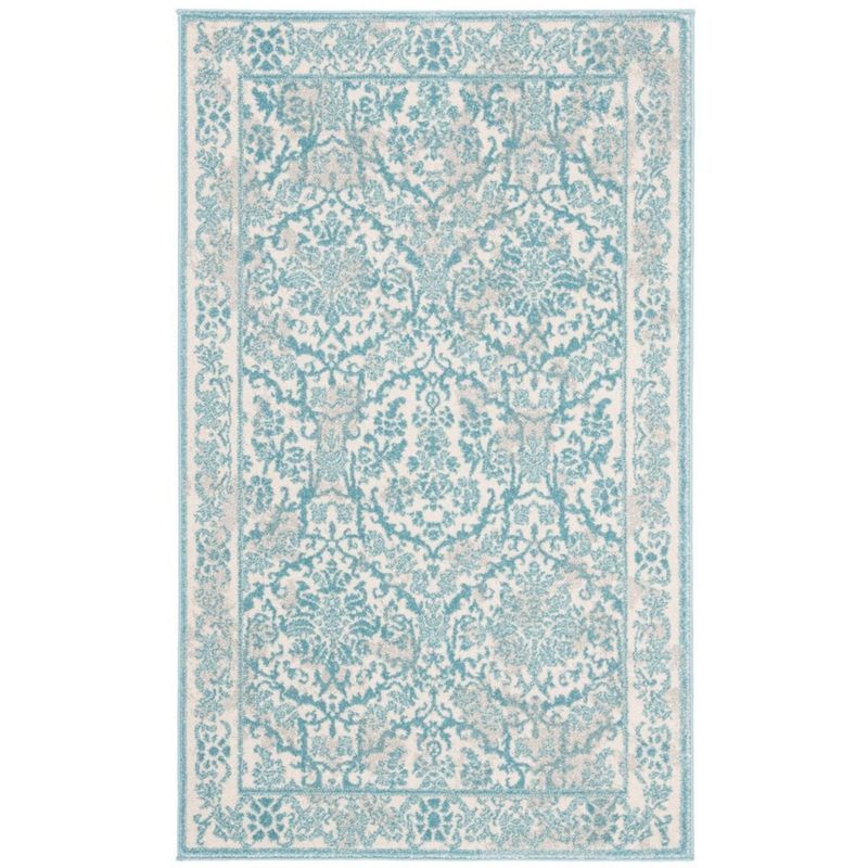 Ivory and Light Blue 4' x 6' Floral Synthetic Reversible Rug