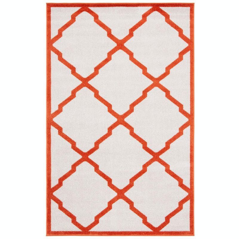 Beige & Orange Geometric Round Synthetic Area Rug 6' x 9'