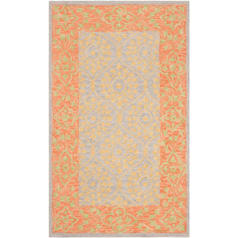 Handmade Orange and Silver Floral Wool Area Rug 3' x 5'