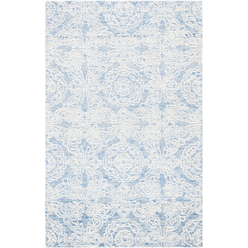 Blue and Ivory 6' x 9' Hand-Tufted Wool Area Rug