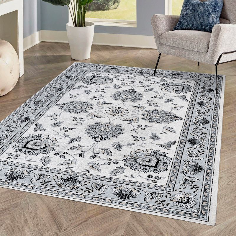 Elegant Light Gray and Cream Persian-Inspired 5' x 8' Area Rug