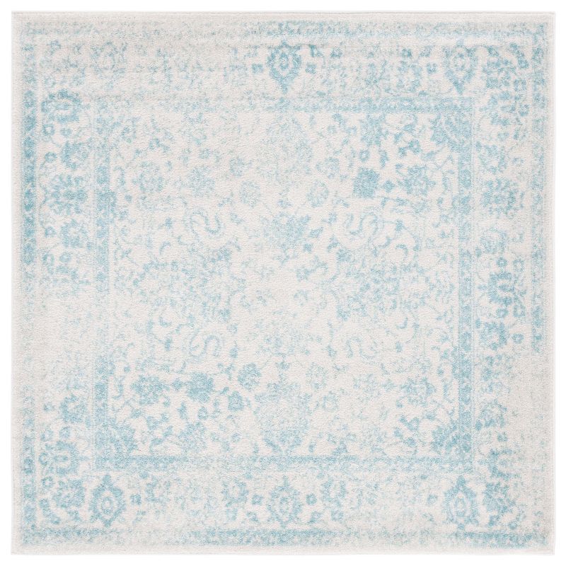 Ivory and Light Blue Square Medallion Synthetic Area Rug