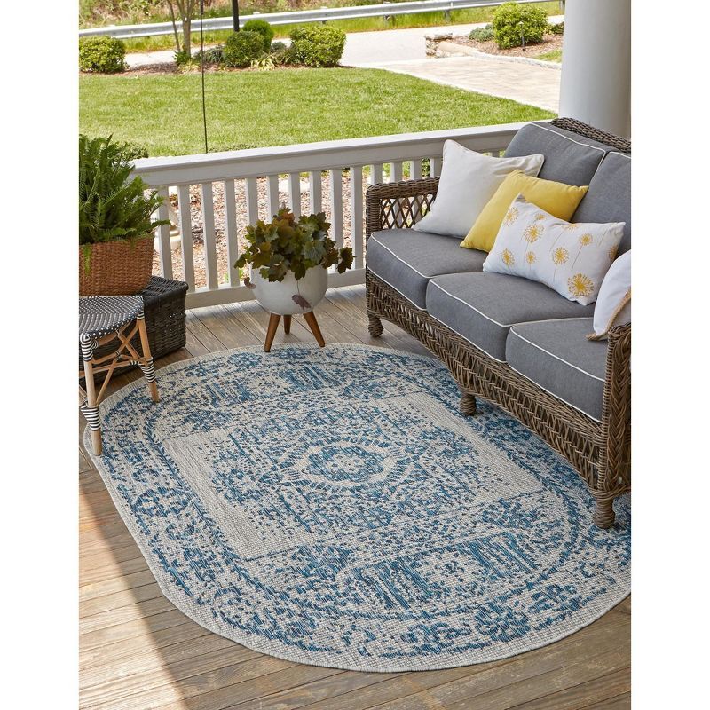 Blue Oval Synthetic Outdoor Traditional Rug