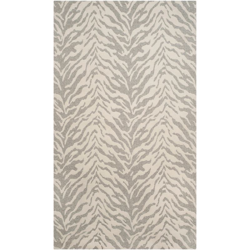 Light Grey and Ivory Rectangular Hand Loomed Area Rug