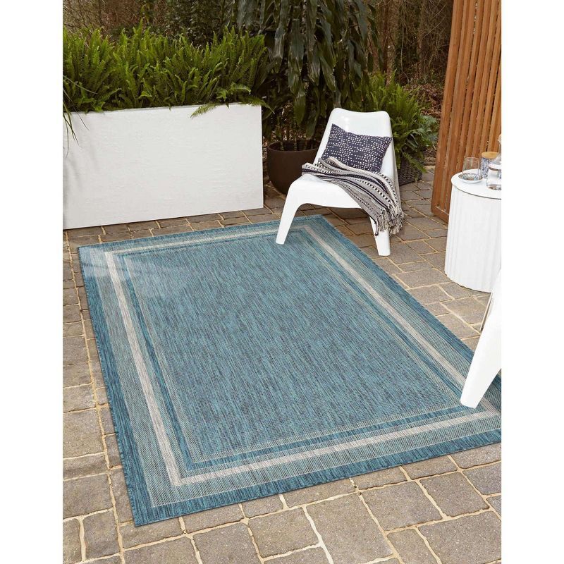 Teal and Beige Synthetic Flat Woven 9' x 12' Outdoor Rug
