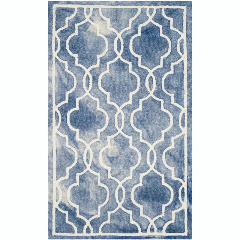 Blue and Ivory Tufted Wool 4' x 6' Area Rug