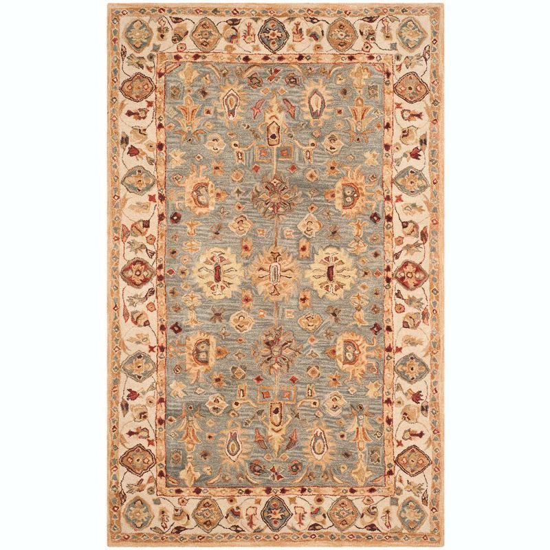 Ivory and Blue Hand Tufted Wool 4' x 6' Area Rug