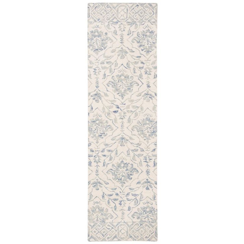 Handmade Light Blue and Ivory Tufted Wool Area Rug