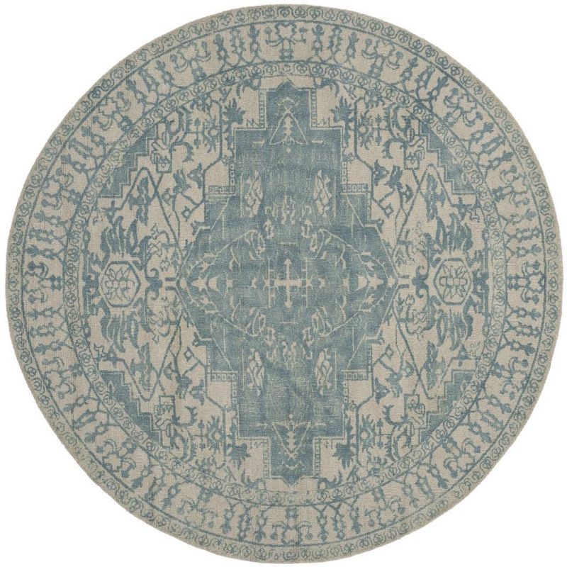 Ivory and Turquoise Round Tufted Wool Area Rug