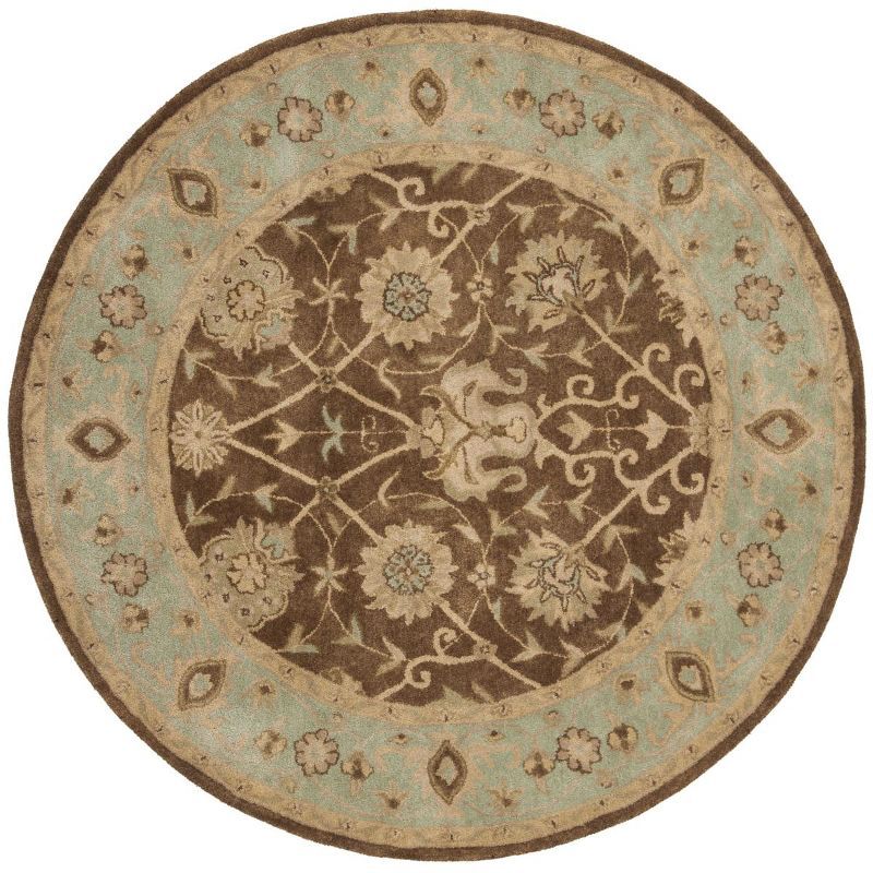 Handmade Tufted Ivory and Brown Wool Round Rug