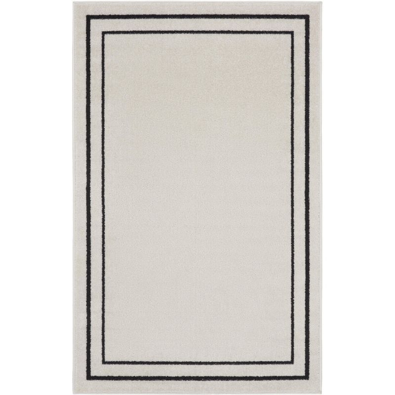 Essential Elegance Ivory/Black Synthetic 2' x 4' Outdoor Rug