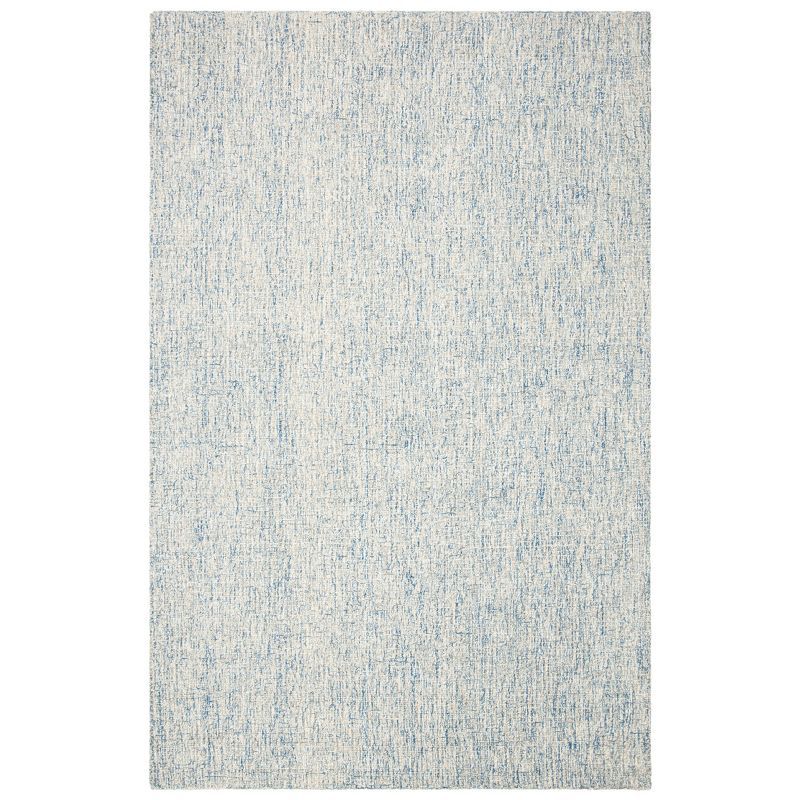 Handmade Ivory and Blue Wool Abstract Area Rug