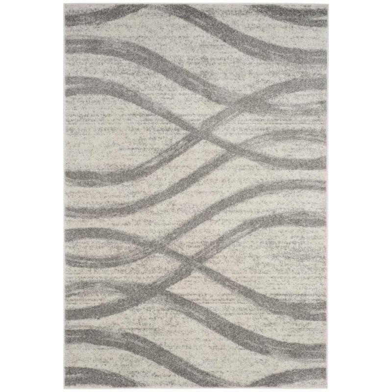 Cream and Grey Abstract 6' x 9' Synthetic Area Rug