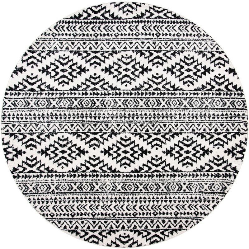 Ivory and Black Round Geometric Synthetic Area Rug