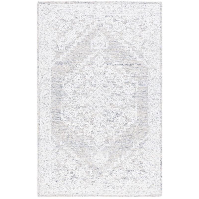 Ivory Tufted Handmade Wool and Synthetic 6' x 9' Area Rug