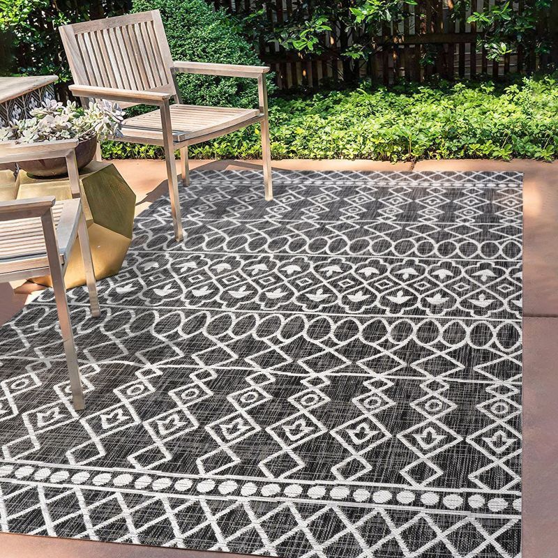 Handmade Rectangular Black/Ivory Diamond Synthetic Area Rug