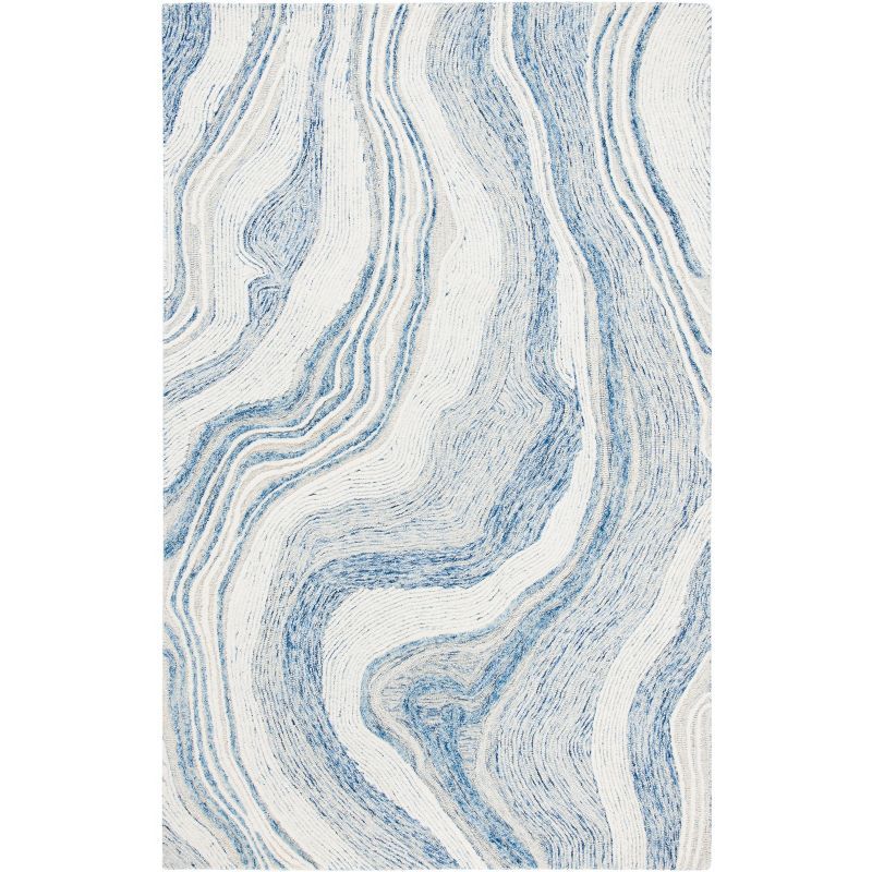 Handmade Blue and Ivory Abstract Wool Area Rug