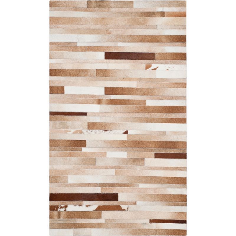 Handwoven Tan and Ivory Geometric Cowhide Area Rug