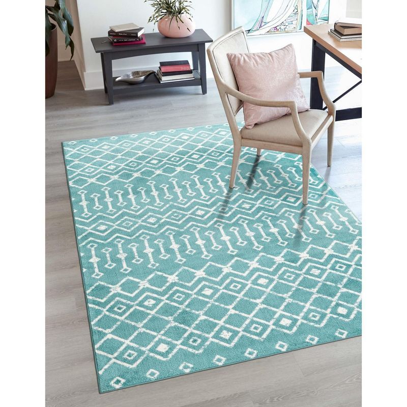 Turquoise and White Synthetic 6' x 9' Trellis Area Rug