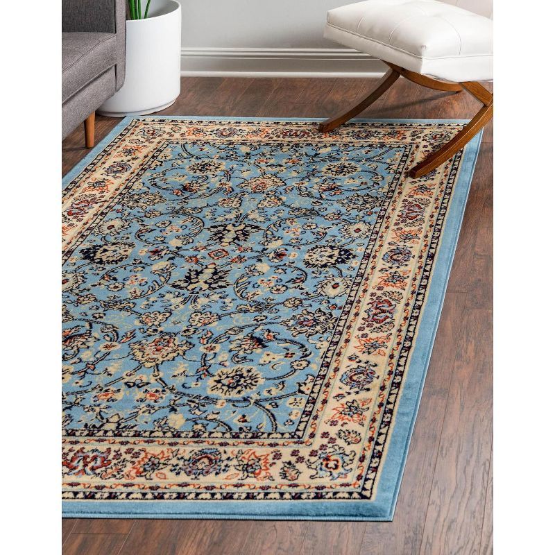 Light Blue and Ivory Synthetic 8' x 10' Reversible Area Rug