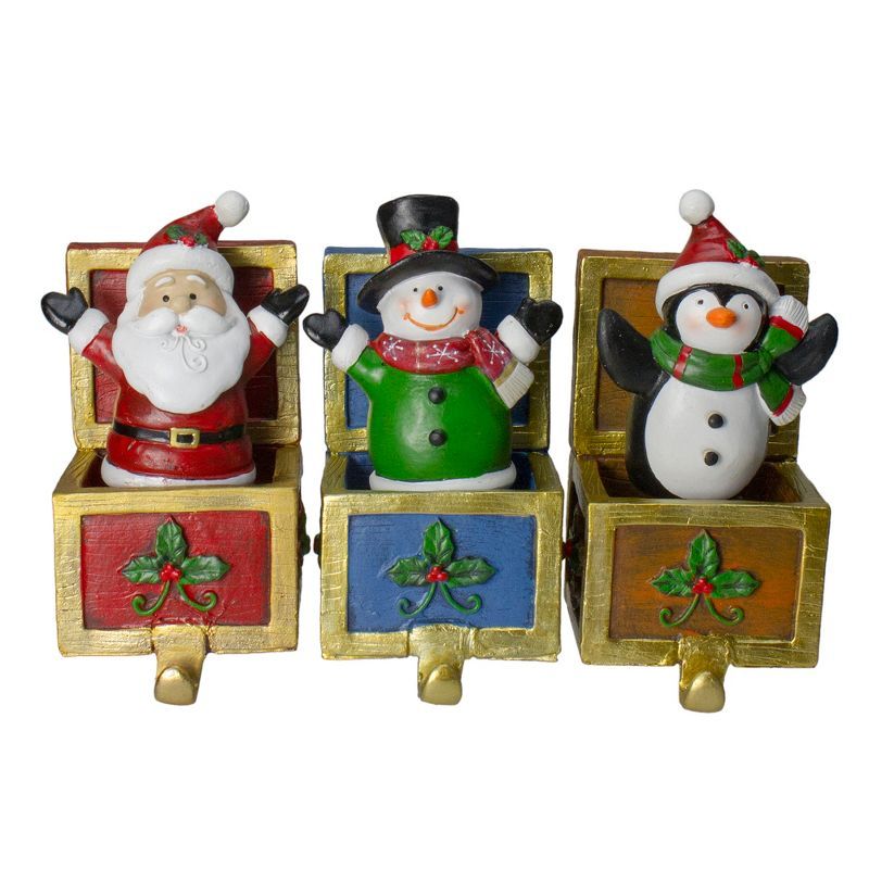 Santa, Snowman, and Penguin Christmas Stocking Holders Set