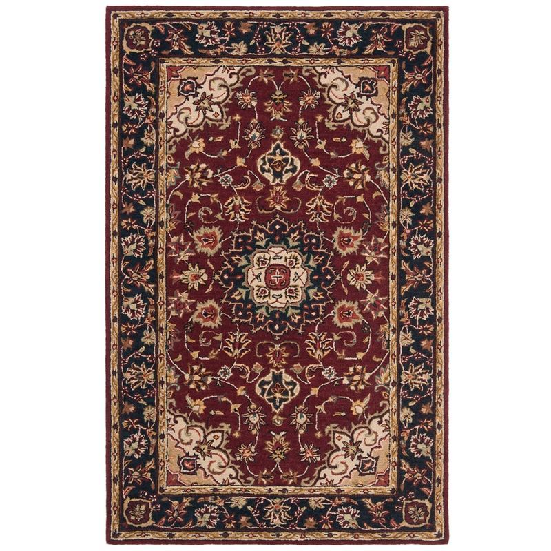 Handmade Oval Tufted Blue Wool Area Rug 6' x 9'