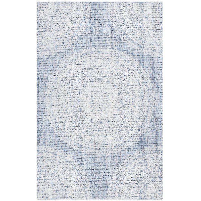 Blue and Ivory Hand Tufted Wool Area Rug 5' x 8'