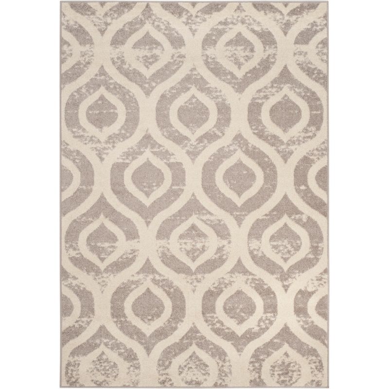 Ivory and Mauve Geometric Low Pile Area Rug