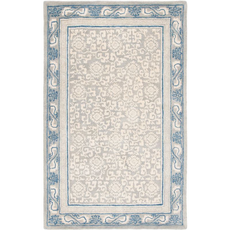 Gray and Ivory Handmade Wool 4' x 6' Area Rug