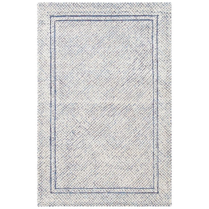 Ivory and Navy Abstract Hand Tufted Wool Area Rug