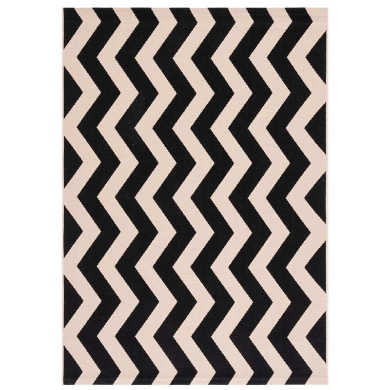 Elegant Black and Beige Rectangular Synthetic Area Rug - 47"x5'7"