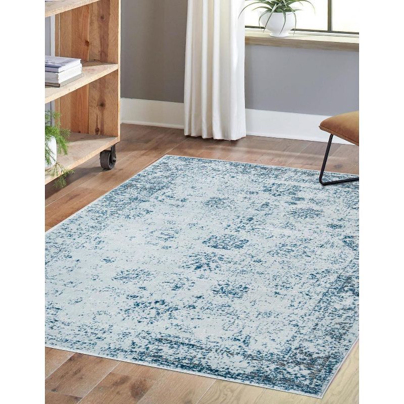 Reversible Handmade Light Blue Synthetic Indoor Rug