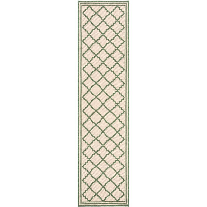 Cream and Green Synthetic Stain-Resistant Indoor/Outdoor Rug