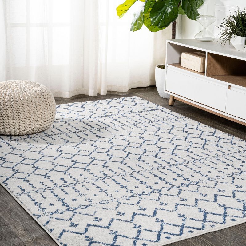 Ivory and Navy 4' x 6' Synthetic Trellis Area Rug