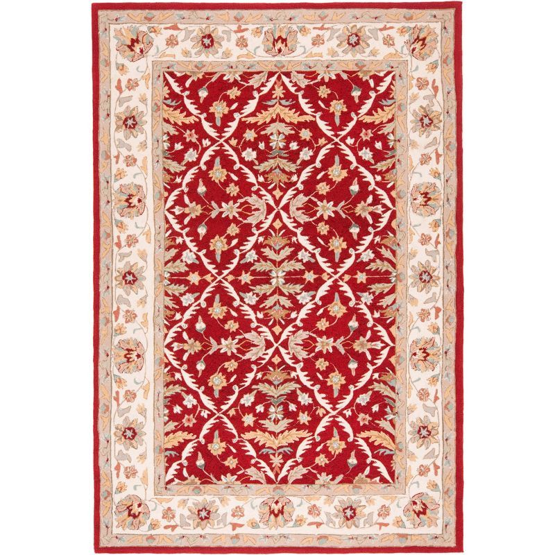 Red and Ivory Hand-Hooked Synthetic 6' x 9' Area Rug