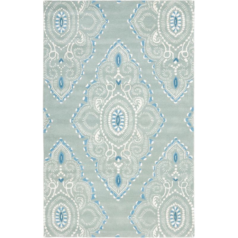 Hand-Tufted Blue and Ivory Wool Area Rug, 5' x 8'