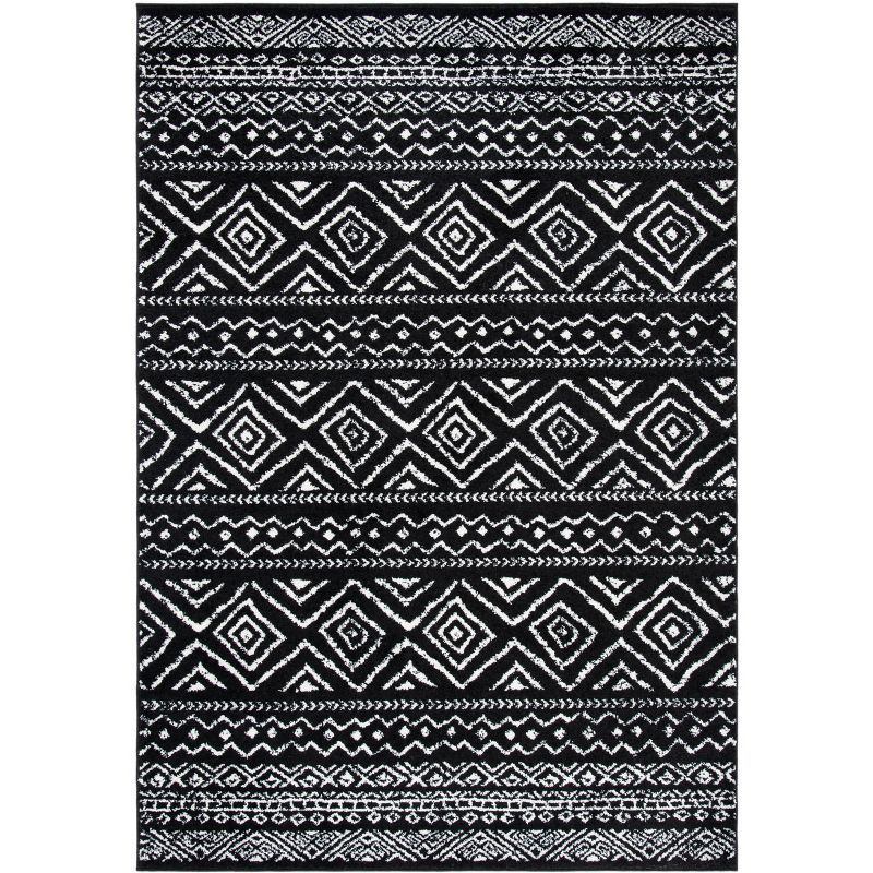Black and Ivory Geometric Synthetic Rectangular Area Rug, 5'3" x 7'6"