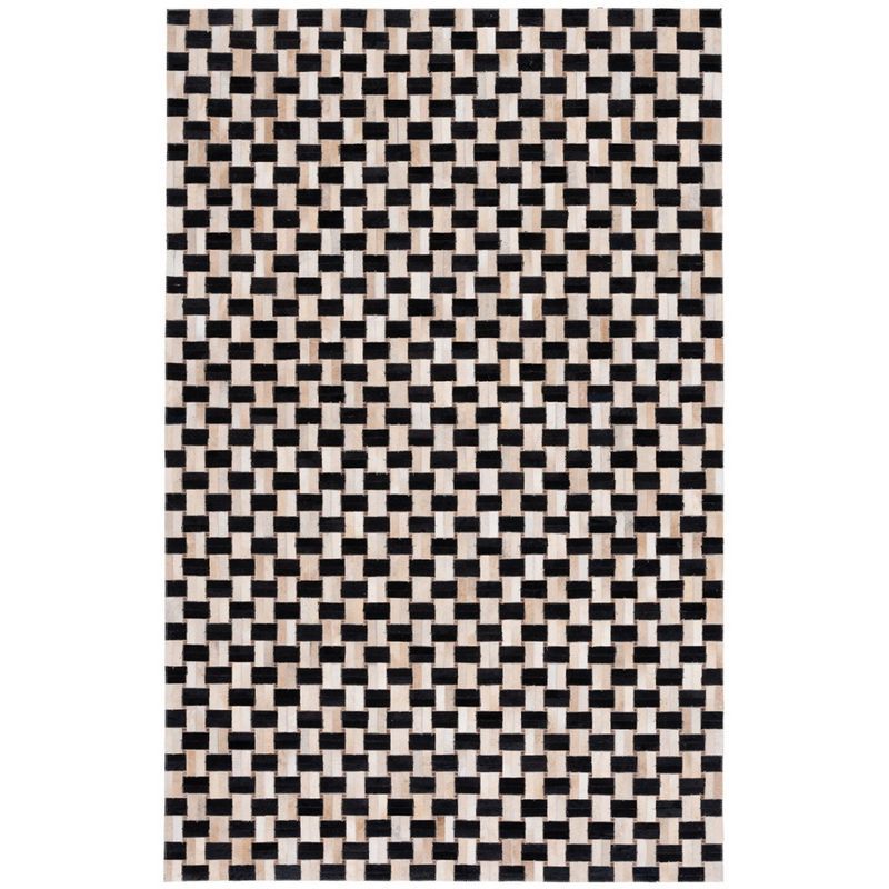 Black and Ivory Handmade Cowhide Area Rug