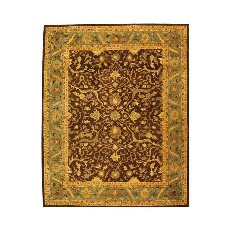 Handmade Tufted Oval Blue and Brown Wool Area Rug