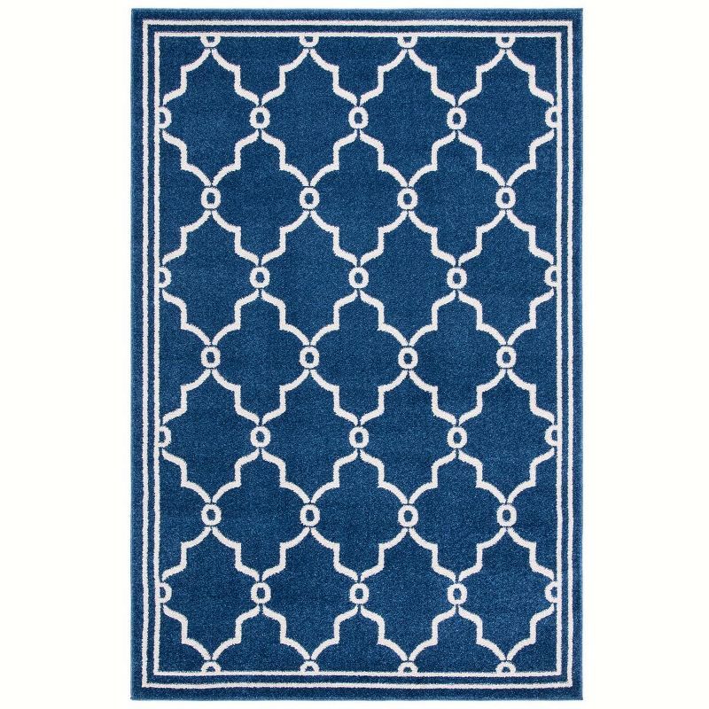 Navy and Beige Geometric 6' x 9' Synthetic Area Rug