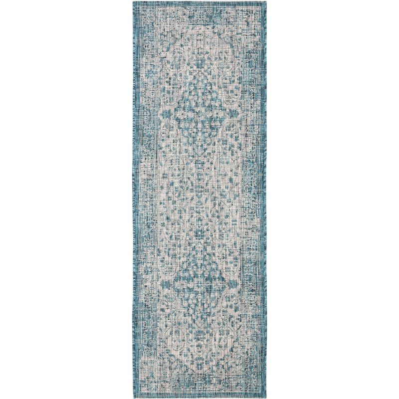 Teal and Cream Synthetic Non-slip Indoor/Outdoor Rug