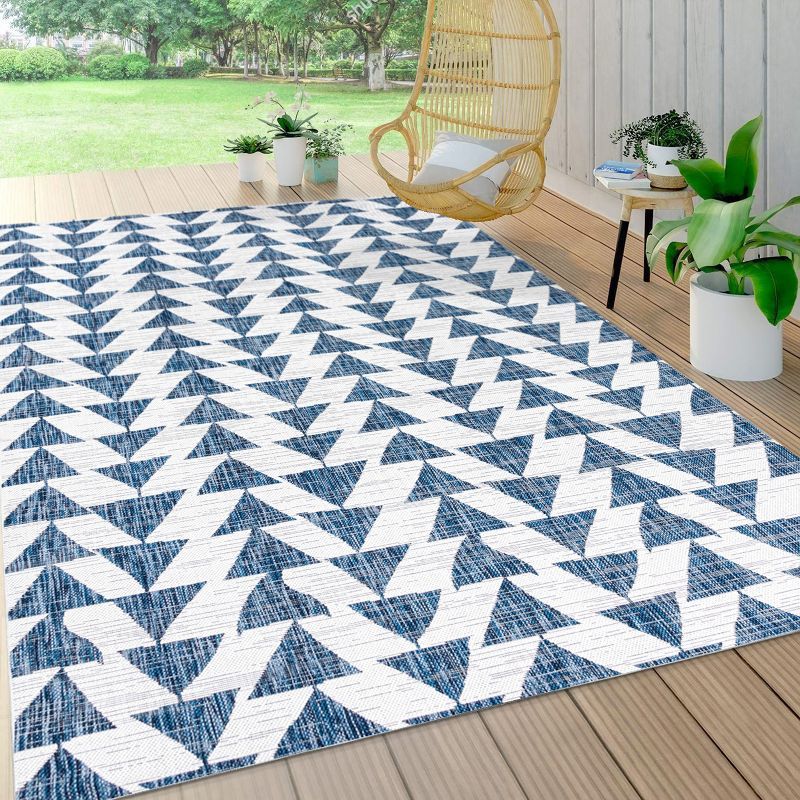 Ivory and Blue Geometric Synthetic Reversible Area Rug, 3x5 Feet