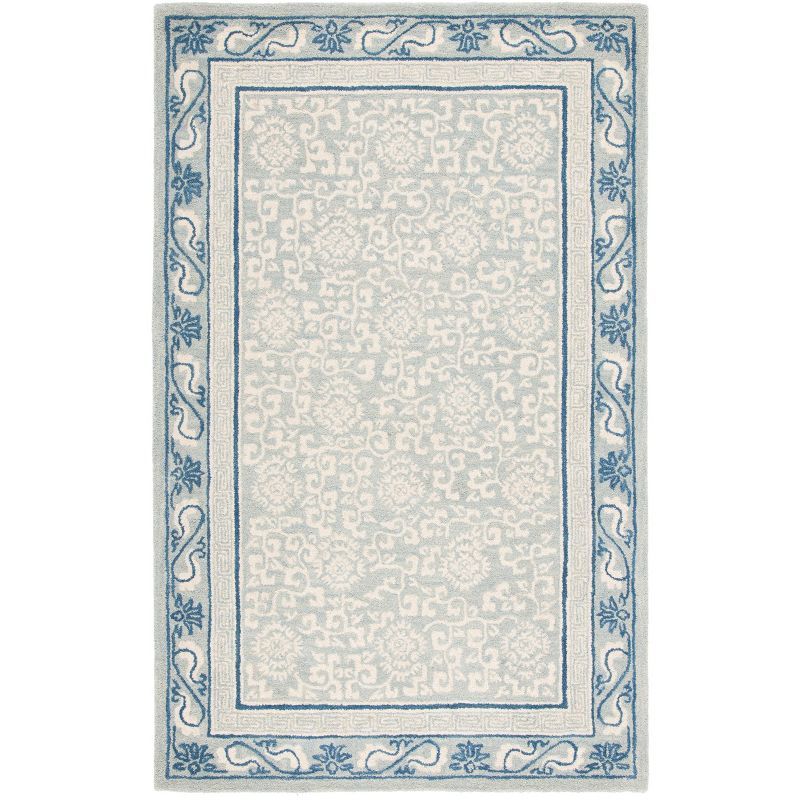 Ivory and Light Blue Hand Tufted Wool Area Rug