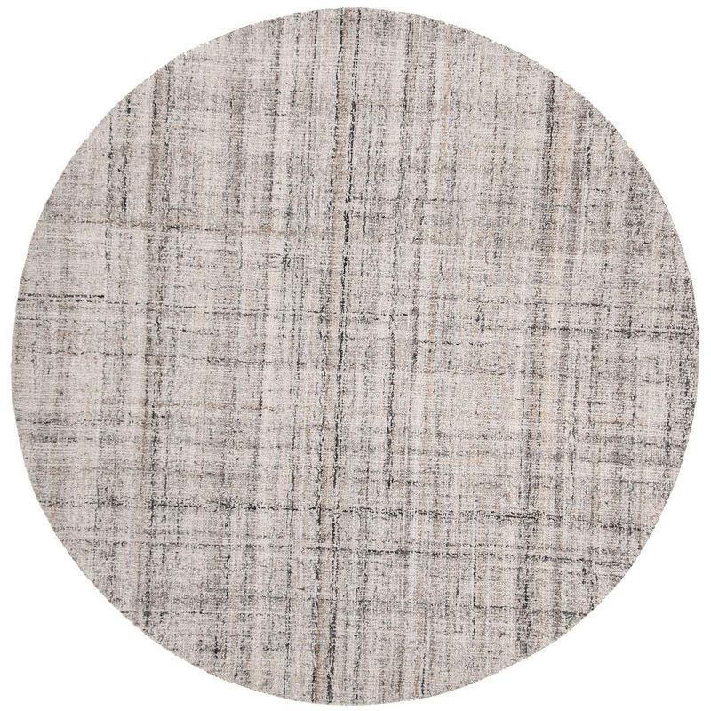 47" Camel and Black Tufted Wool Round Rug