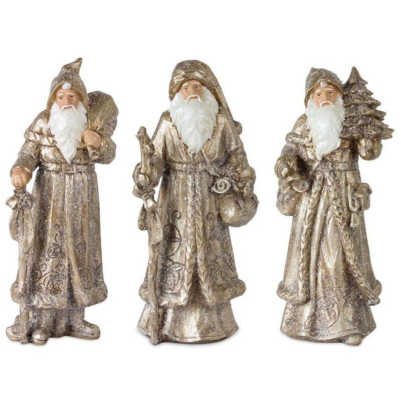 Gold and White Resin Santa Figurine Set