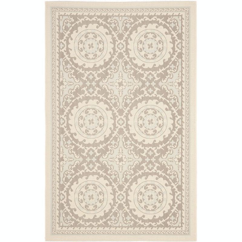 Ivory and Beige Rectangular Synthetic Indoor/Outdoor Area Rug